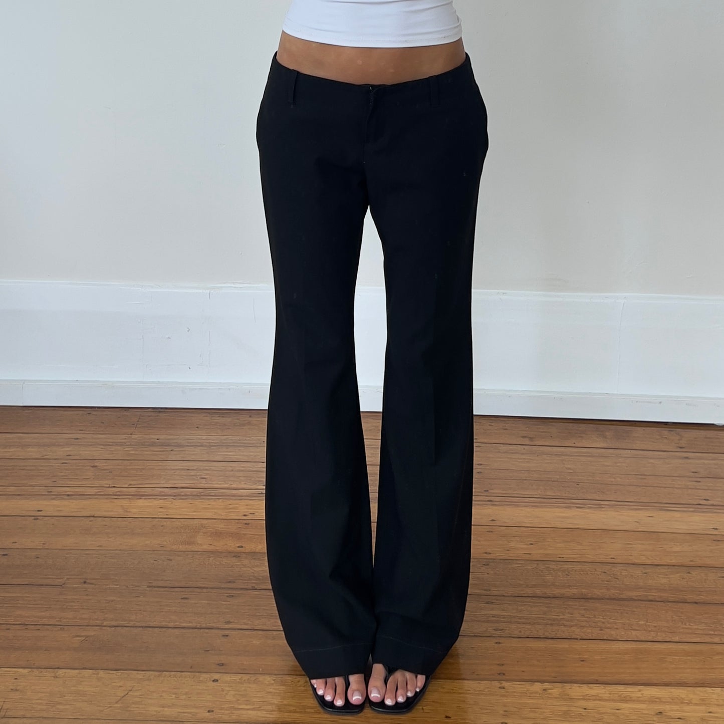 low rise black flared trousers