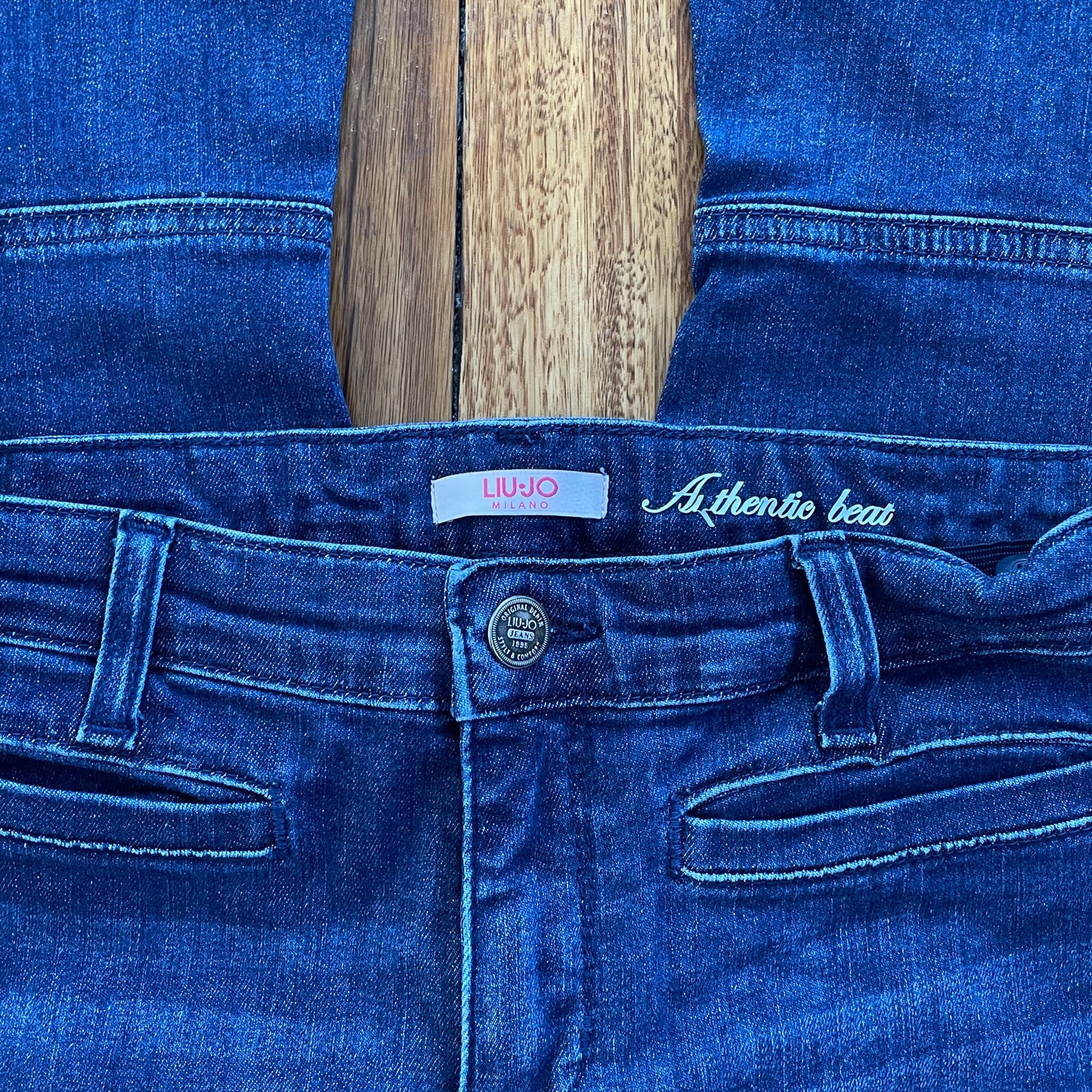 dark denim low rise flared jeans