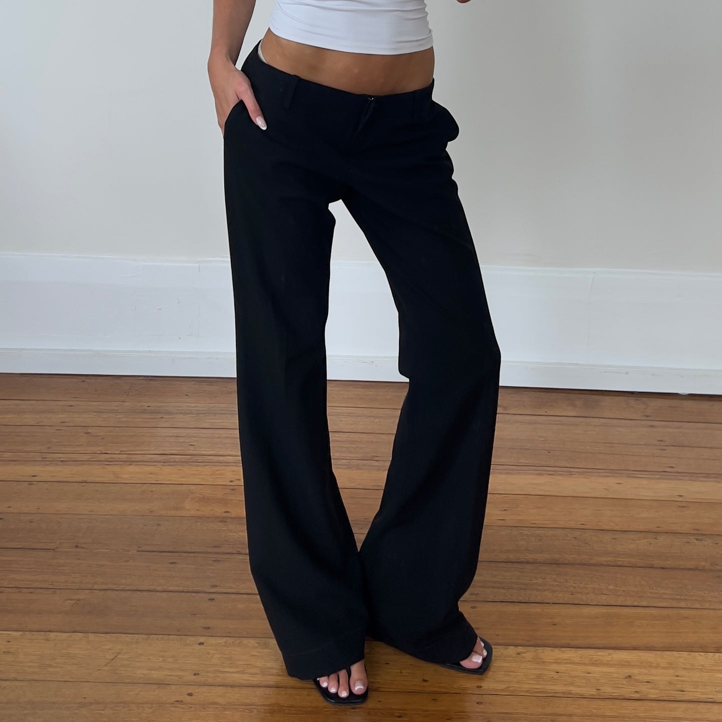 low rise black flared trousers