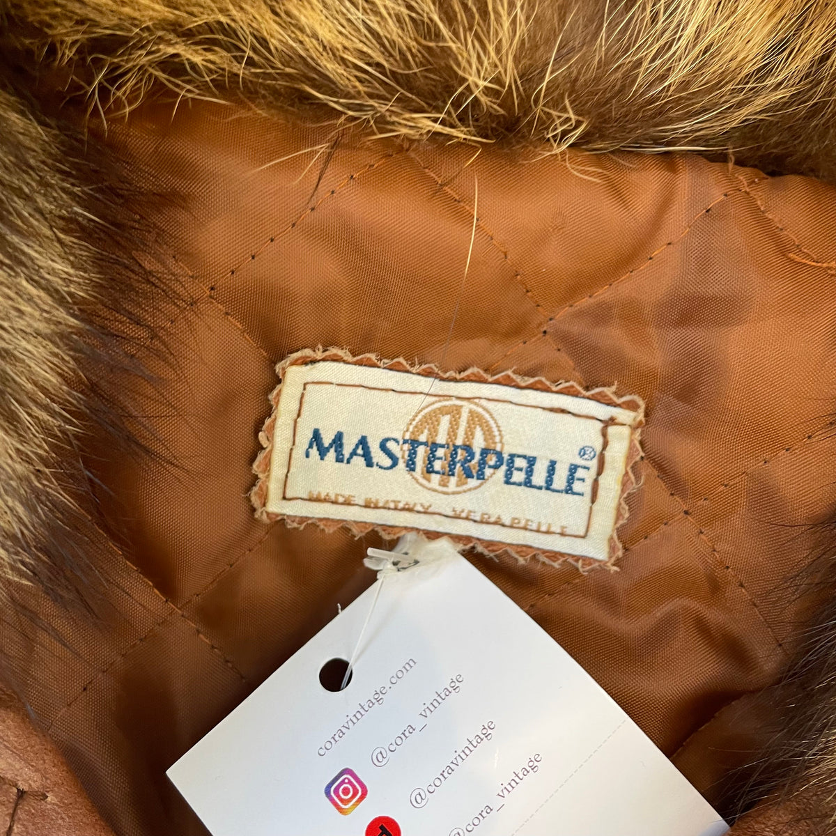 leather/fur jacket