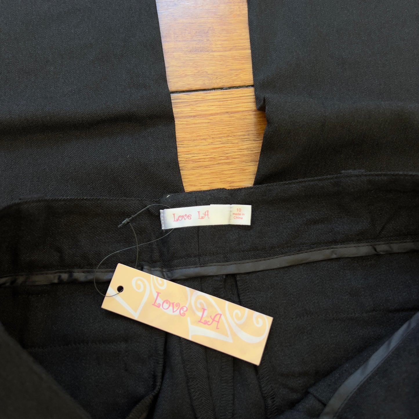 black low rise wide leg trousers