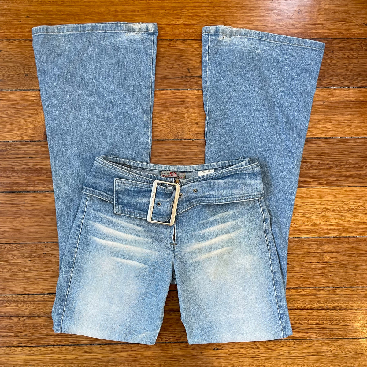 low rise bootcut belt jeans