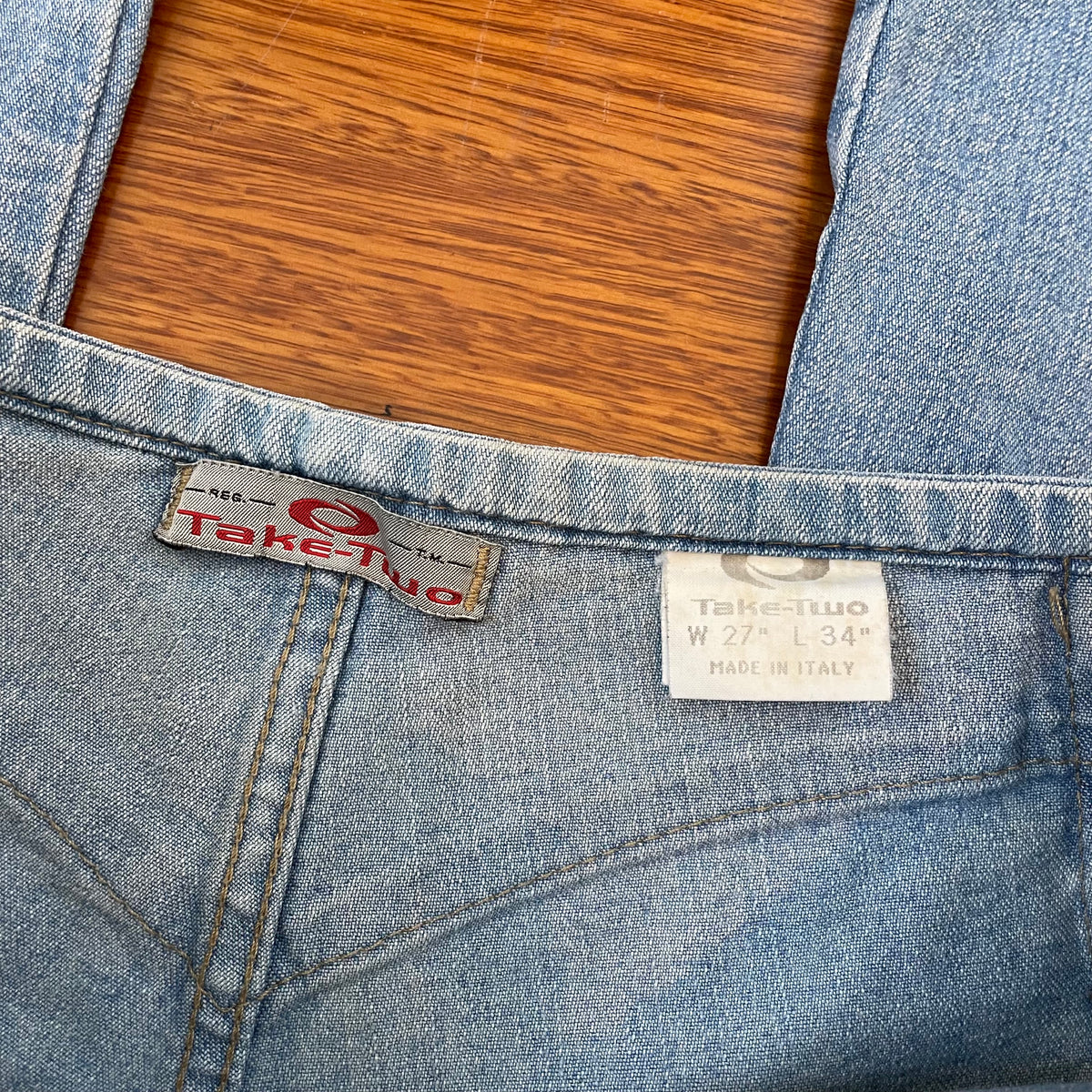 low rise bootcut belt jeans