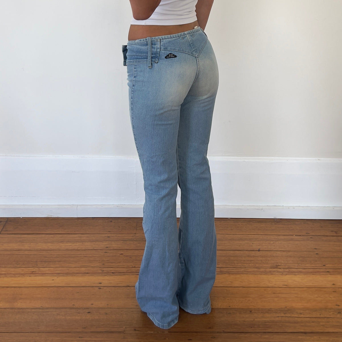 low rise bootcut belt jeans