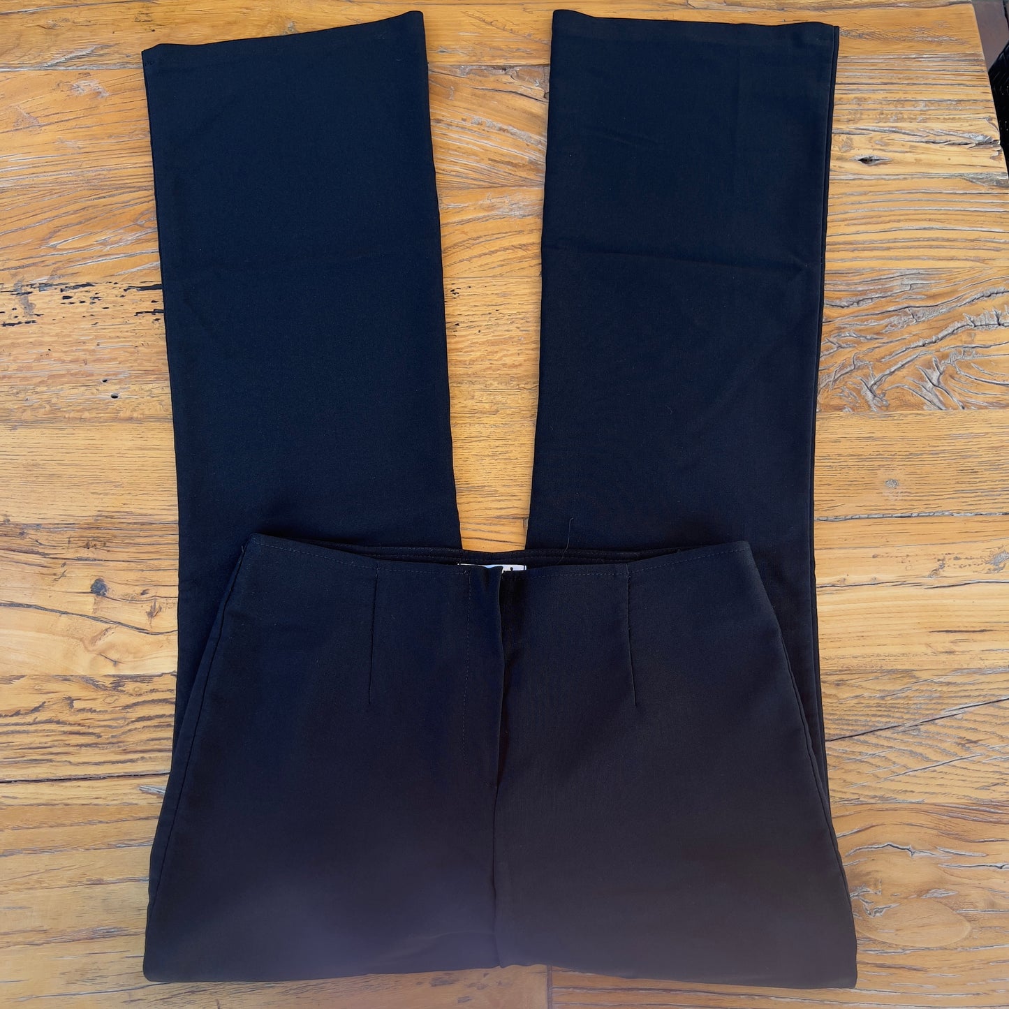 black flared trousers