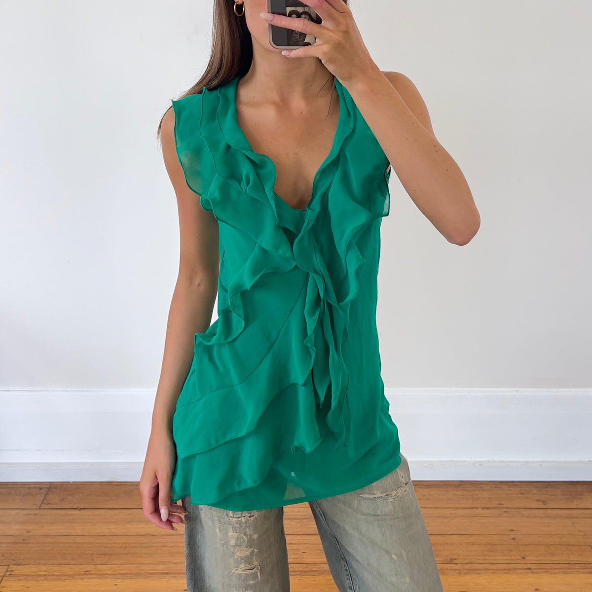 green frilly tunic top