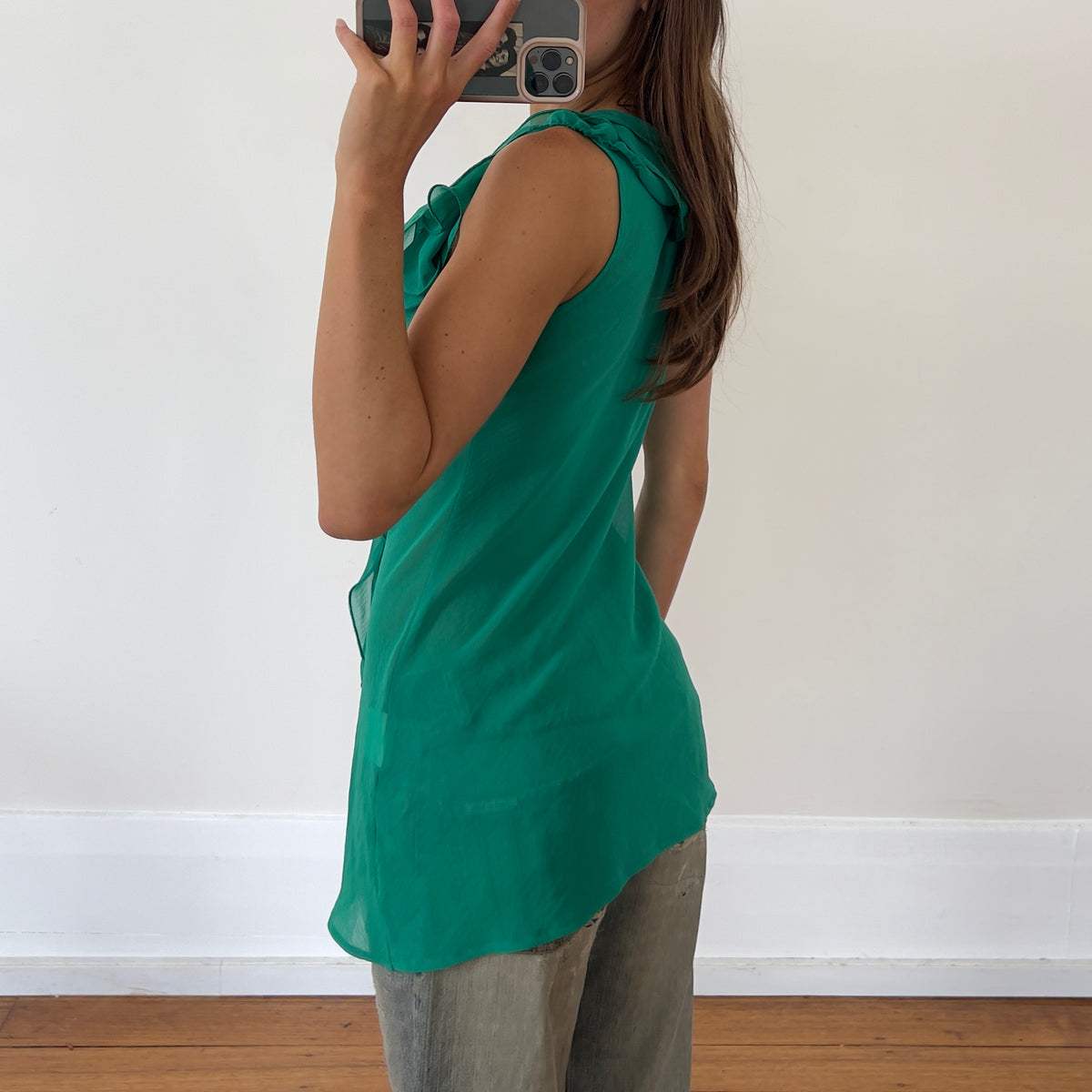 green frilly tunic top