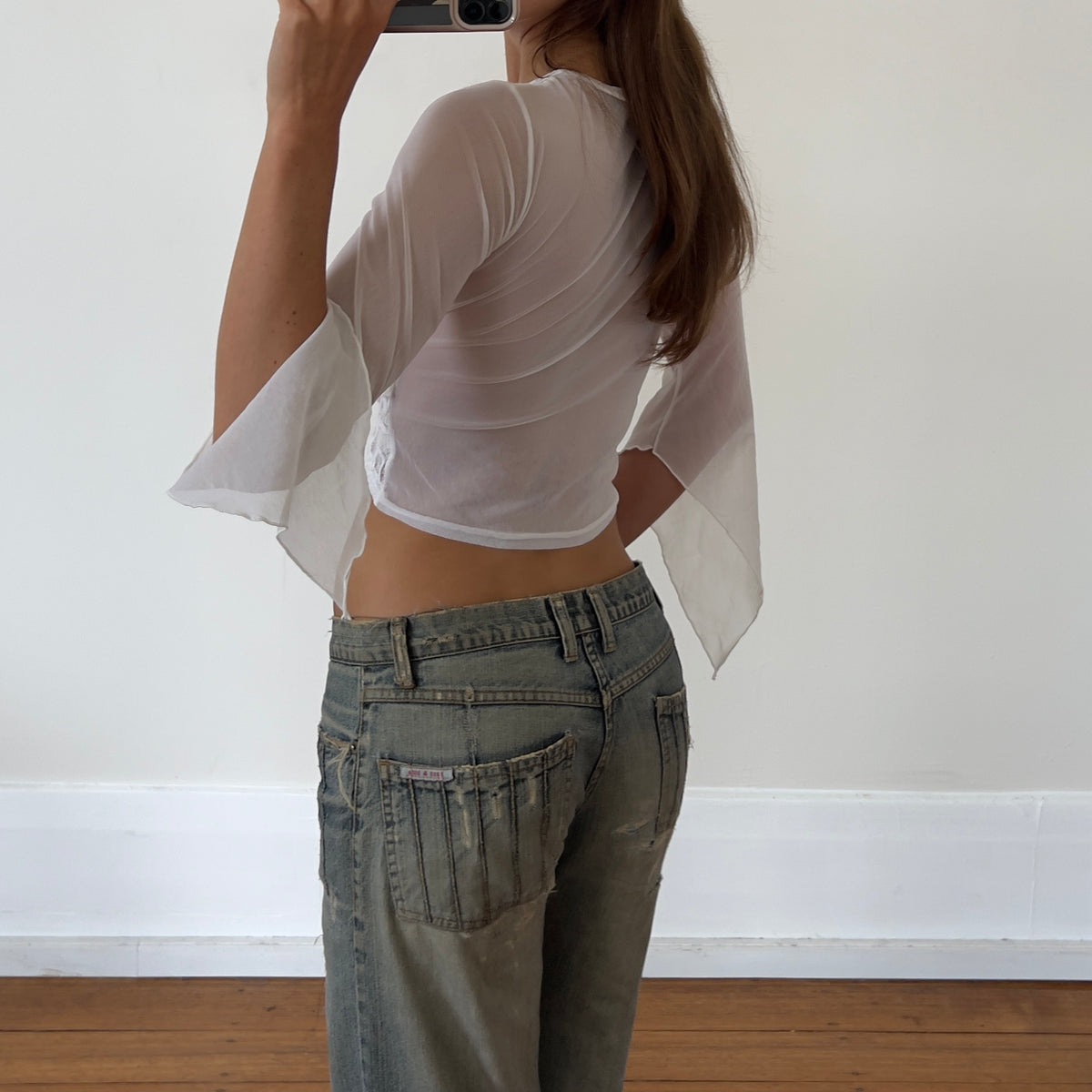 white sheer wrap top