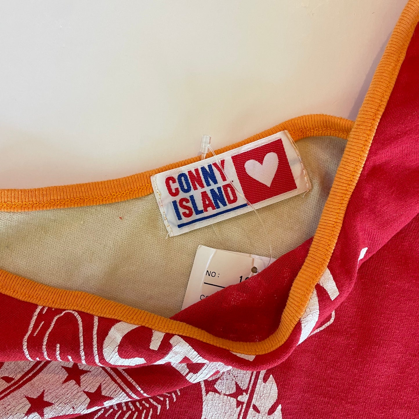 one-shoulder graphic tank