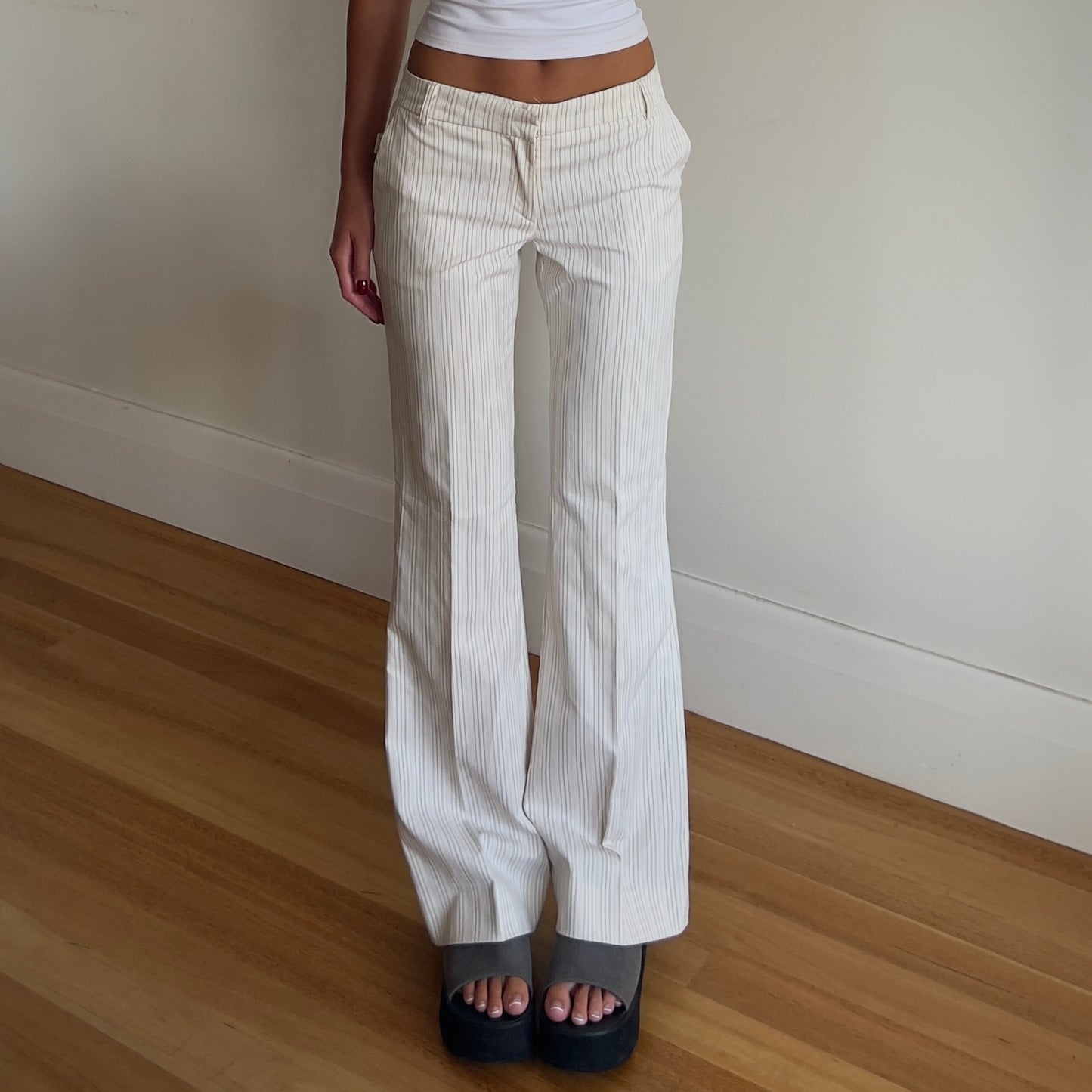 white pinstripe trousers