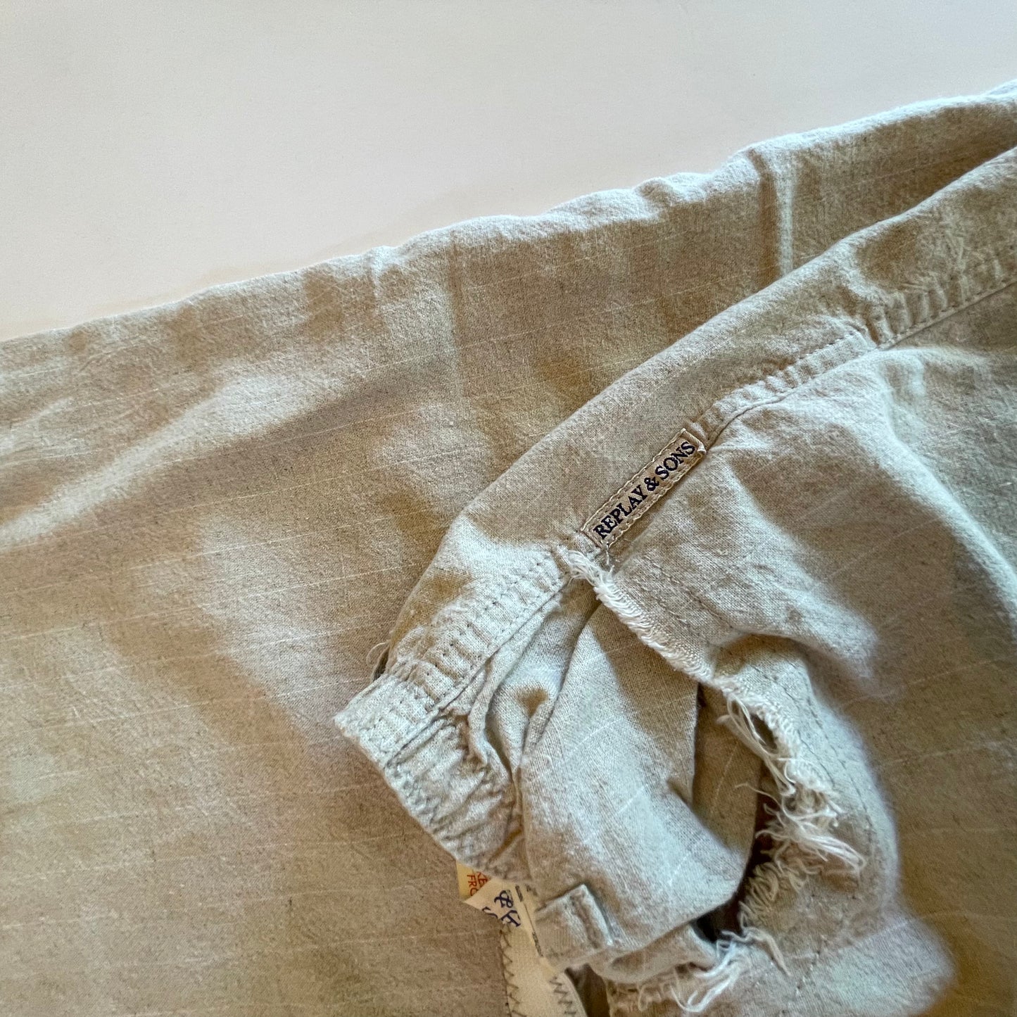 beige pinstriped linen pants
