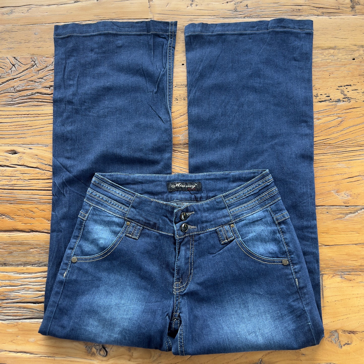 low rise dark denim jeans