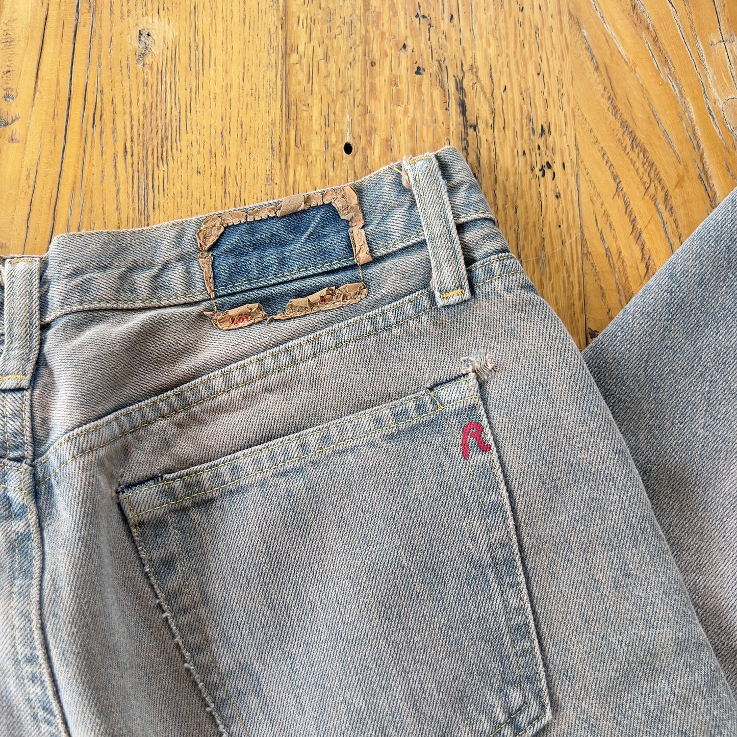 flared acid wash denim jeans