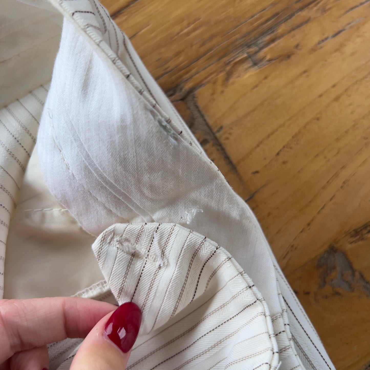 white pinstripe trousers