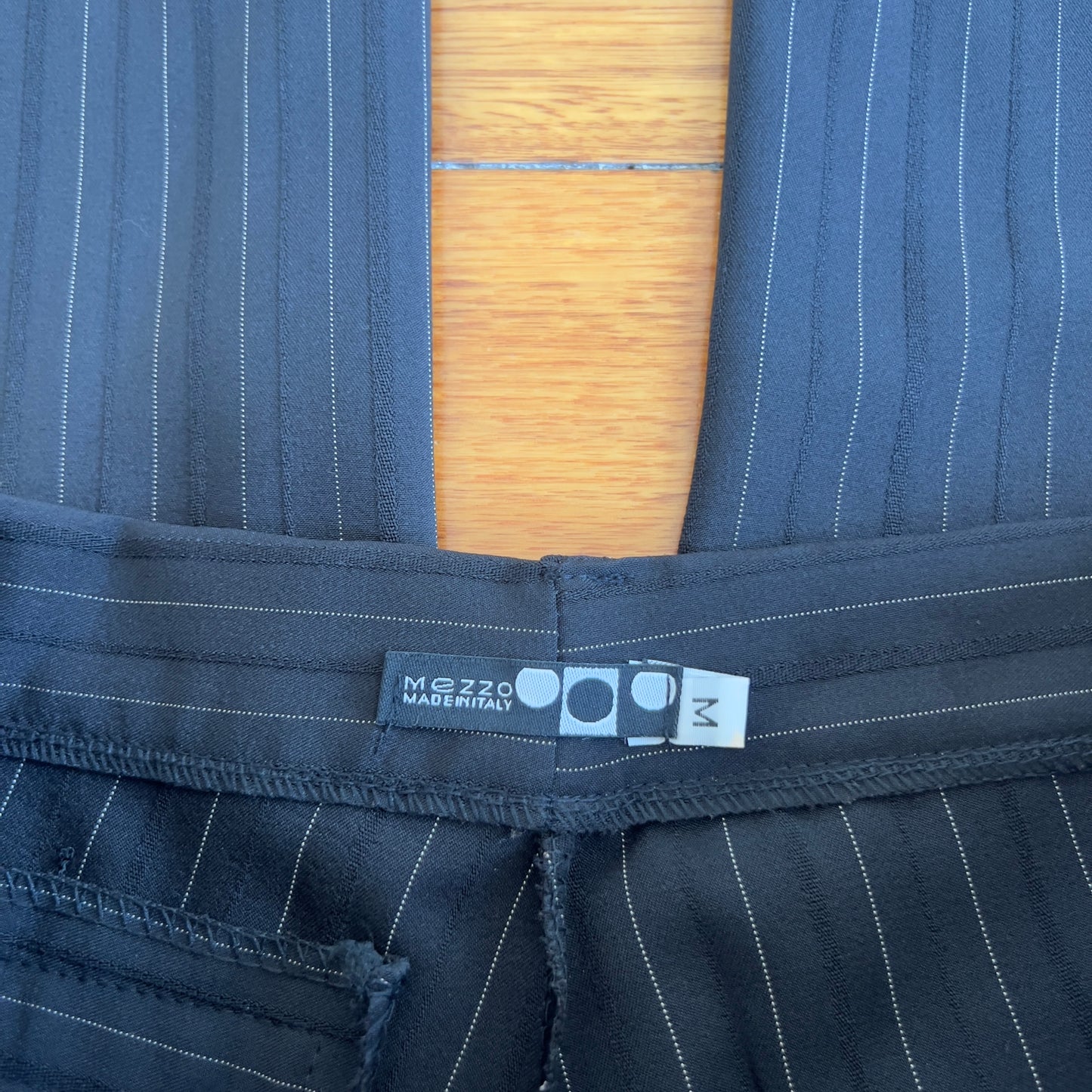 black pinstripe trousers