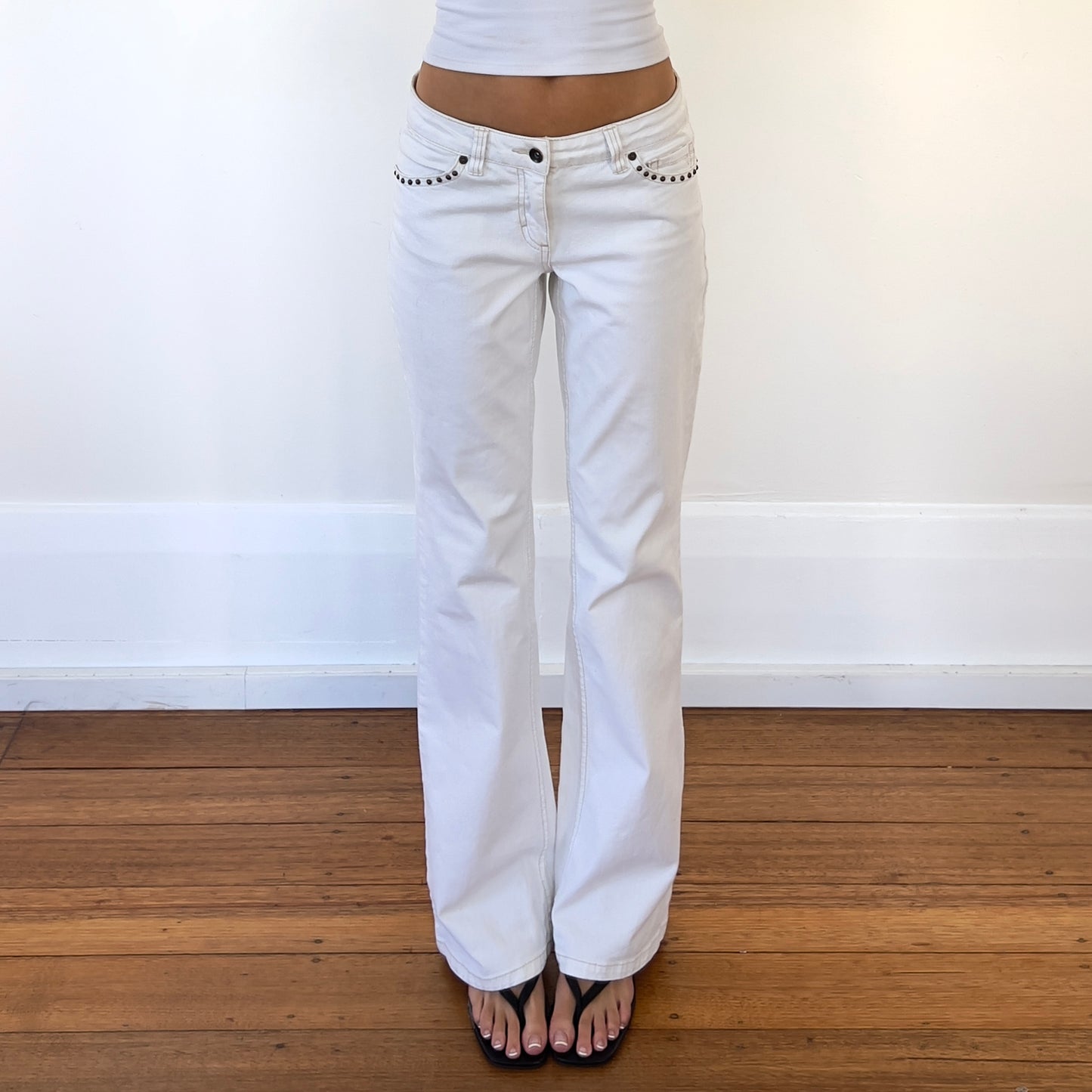 white denim low rise jeans