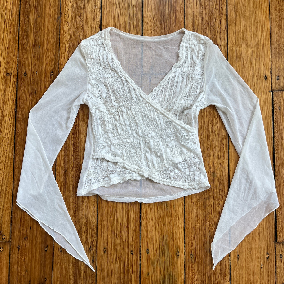 white sheer wrap top