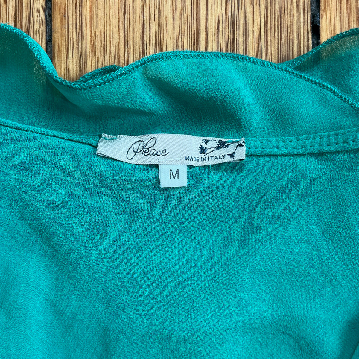 green frilly tunic top