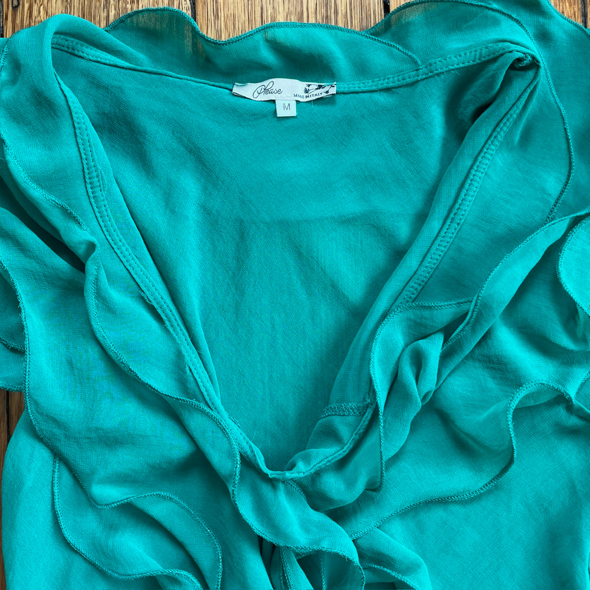 green frilly tunic top