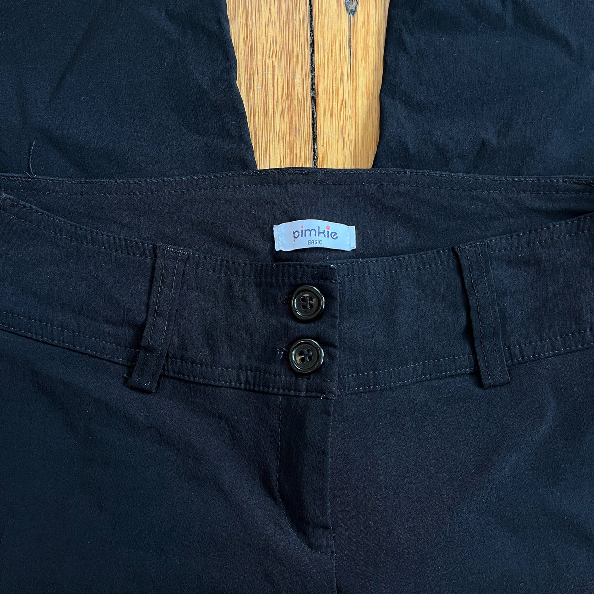 low rise black trousers