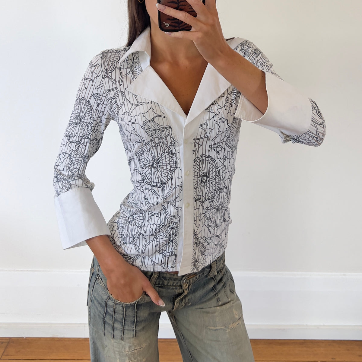 white graphic button-up shirt