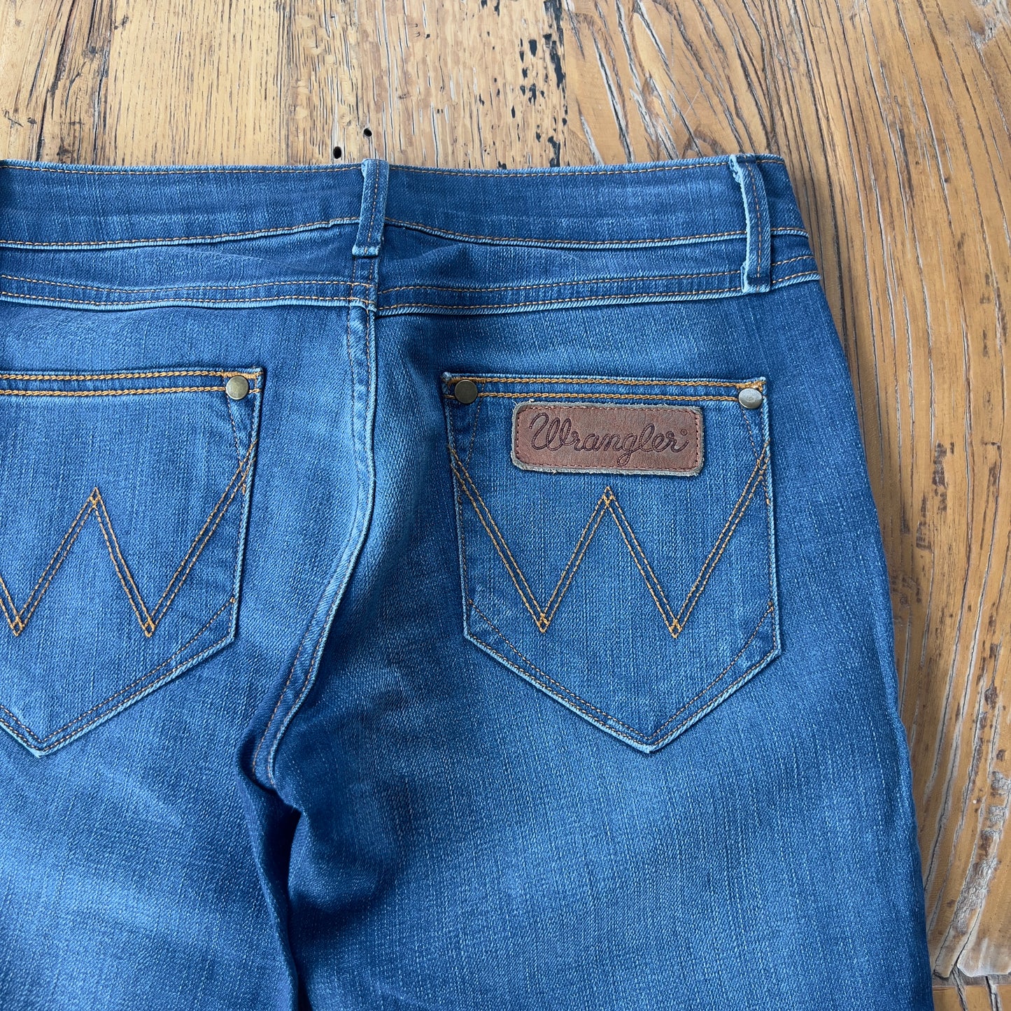 dark wash Wrangler jeans