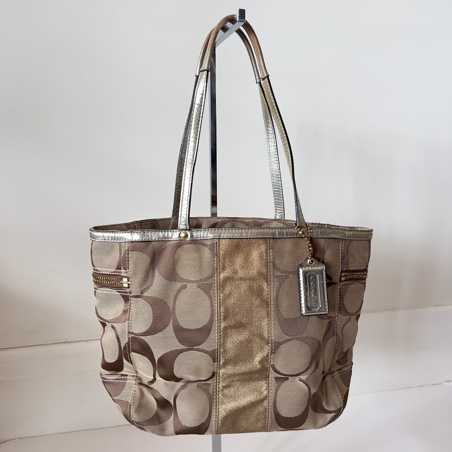 gold signature Coach bag
