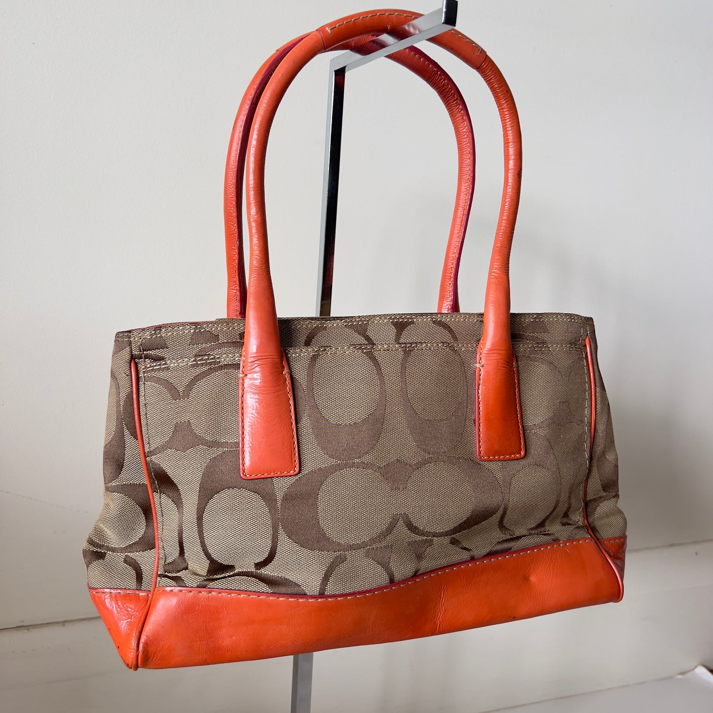 orange signature Coach bag