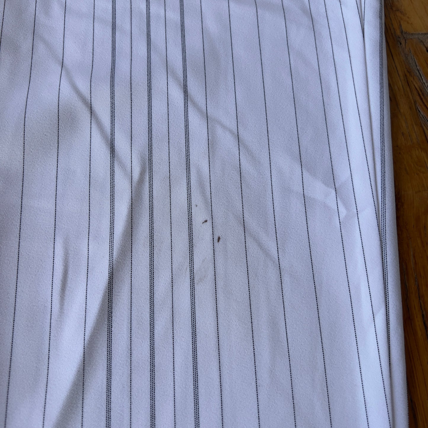 white pinstripe trousers
