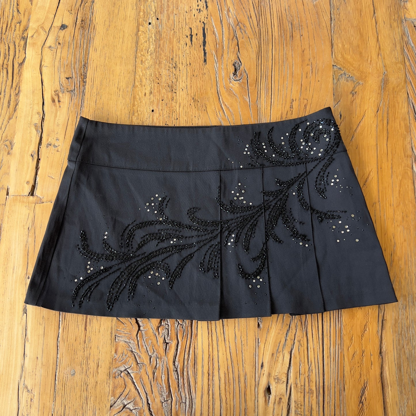 black beaded pleated mini skirt