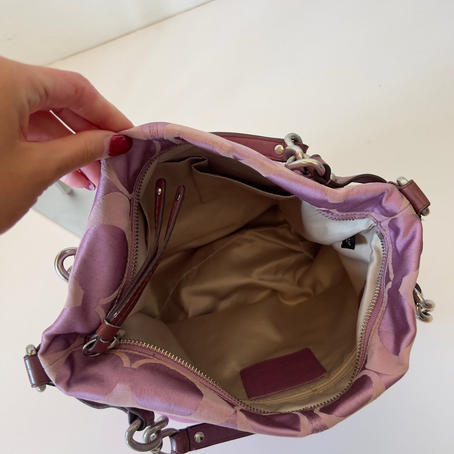 purple signature Coach bag