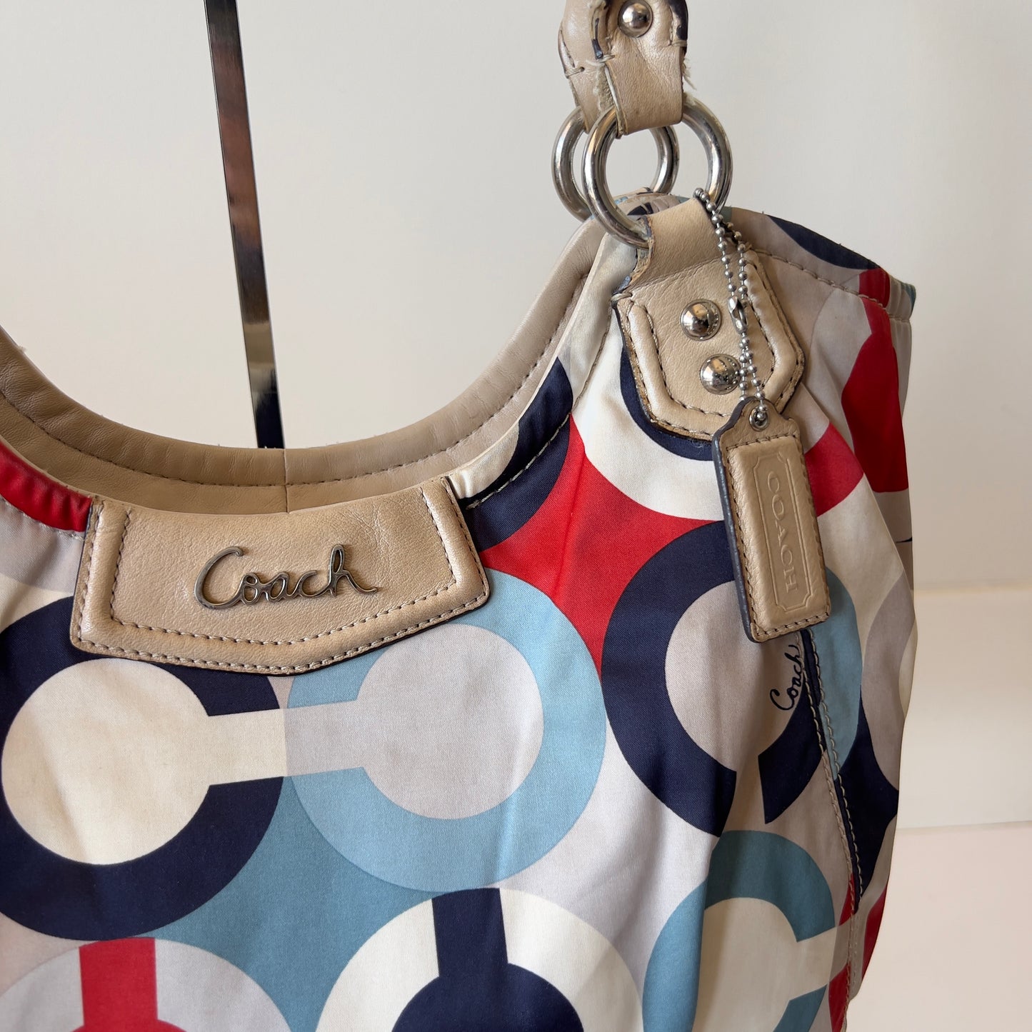 multi coloured Coach hobo bag