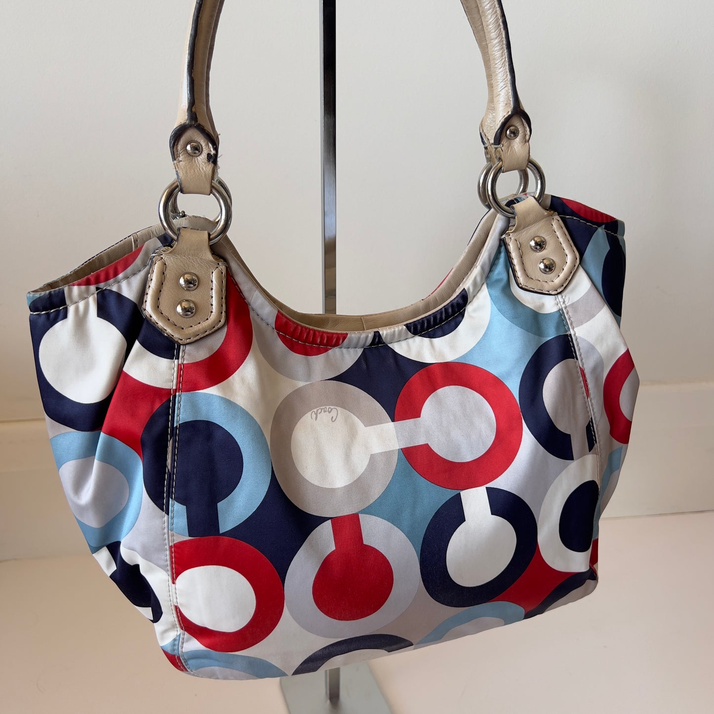 multi coloured Coach hobo bag