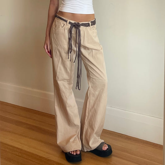 cream trousers w/ tassle belt