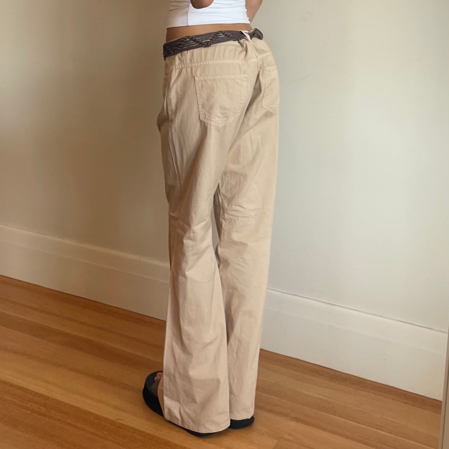 cream trousers w/ tassle belt