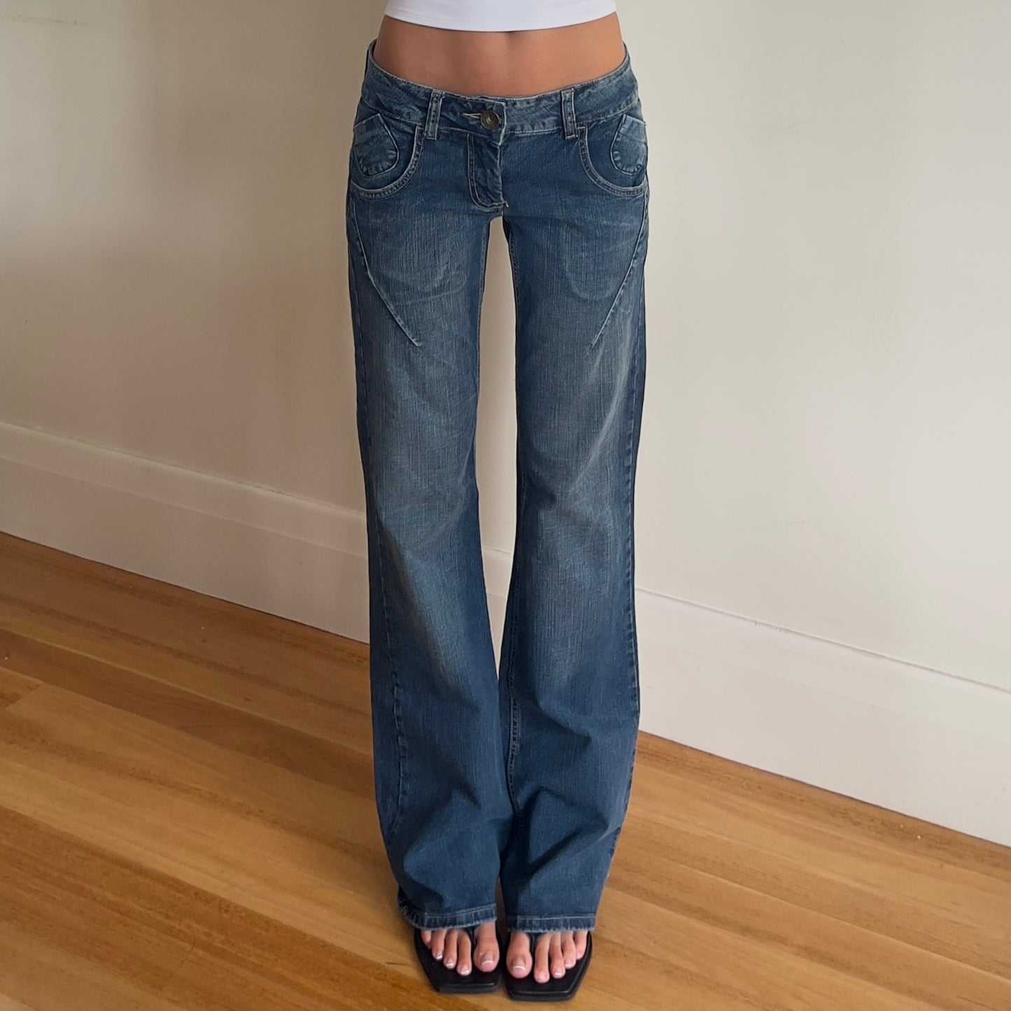 low rise flared denim jeans