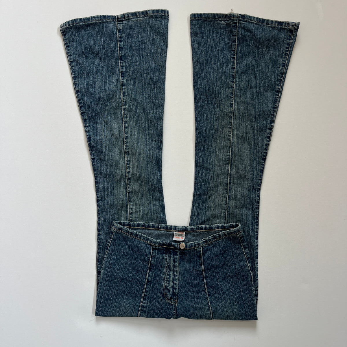 flared pin tuck jeans
