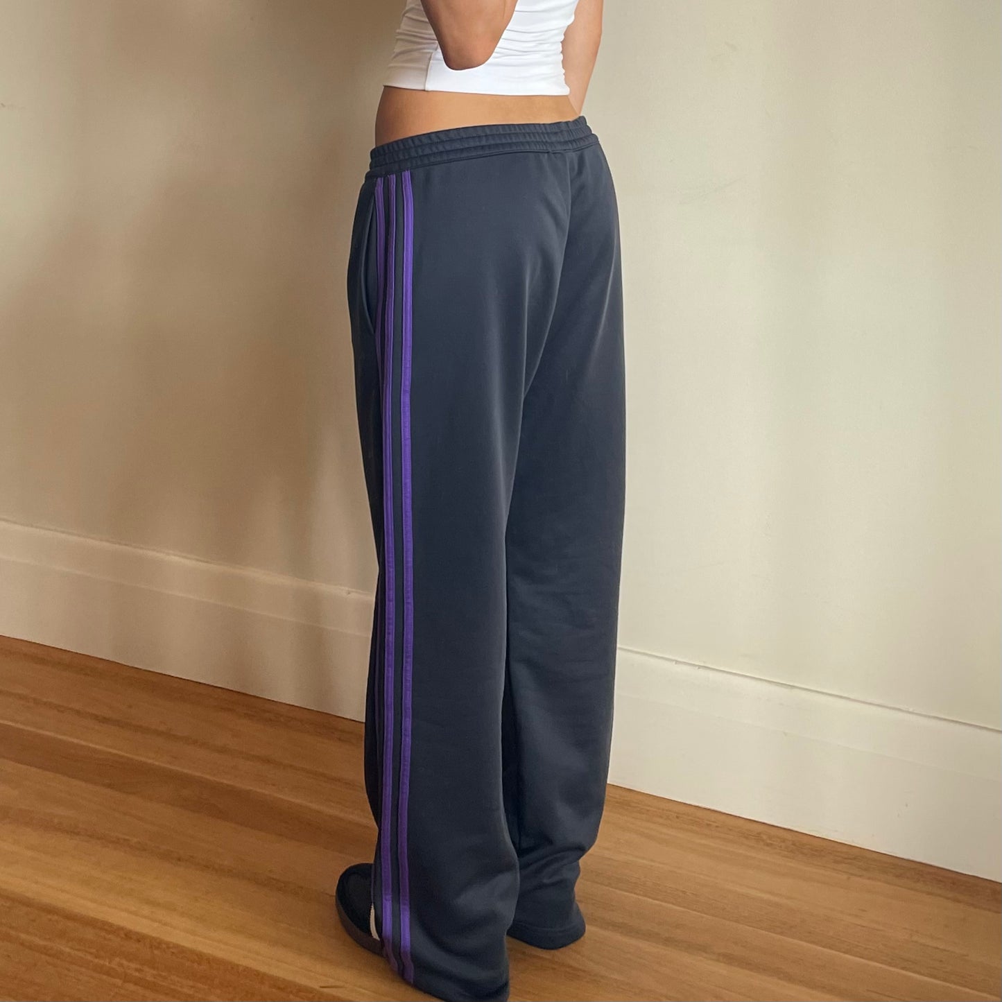 purple Adidas tracksuit pants