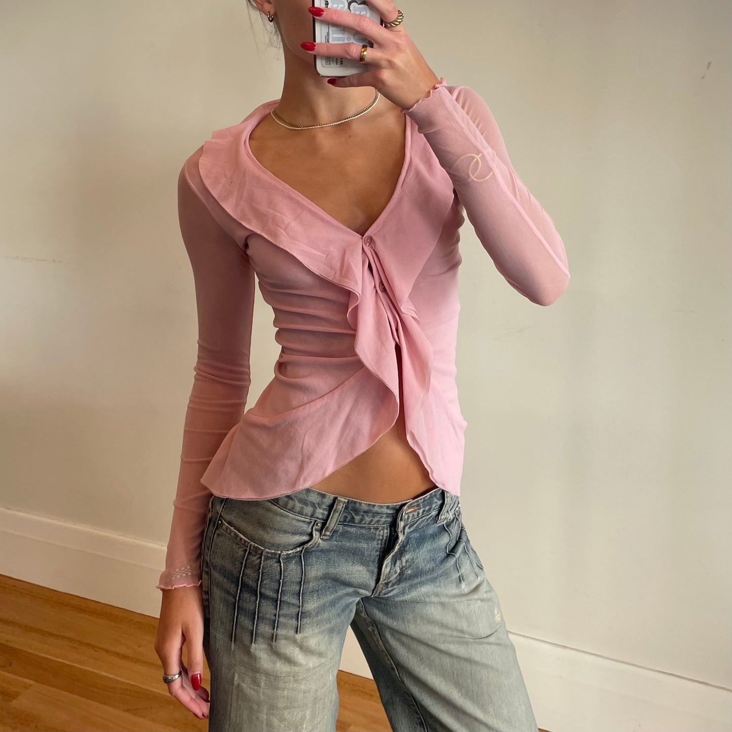 sheer pink blouse