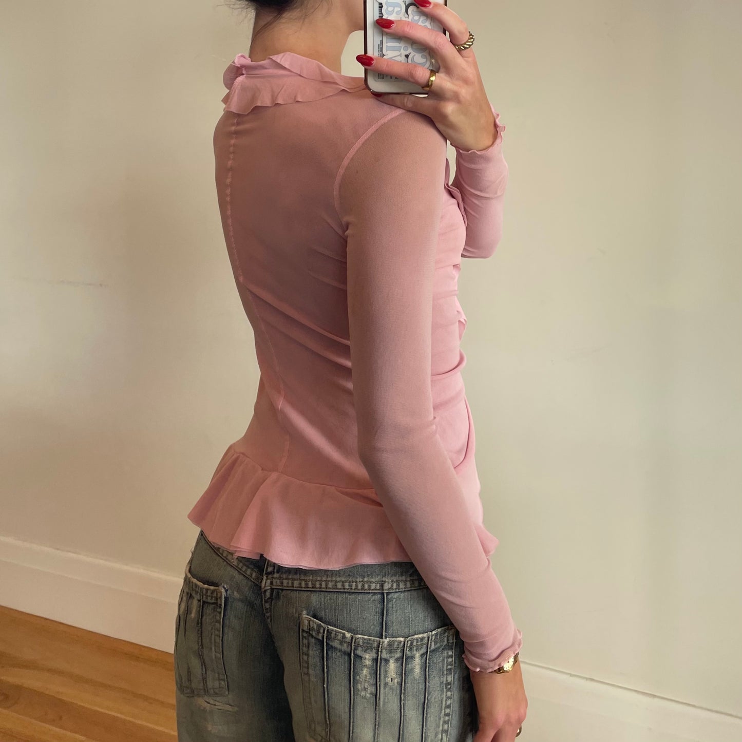 sheer pink blouse