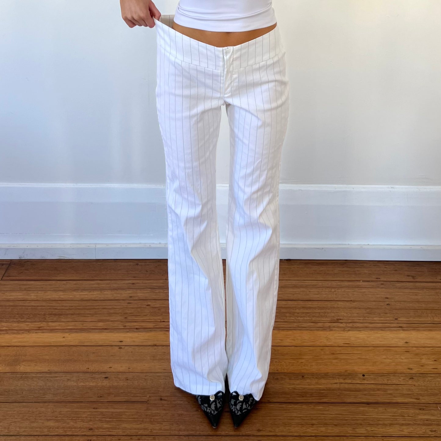 white pinstripe trousers