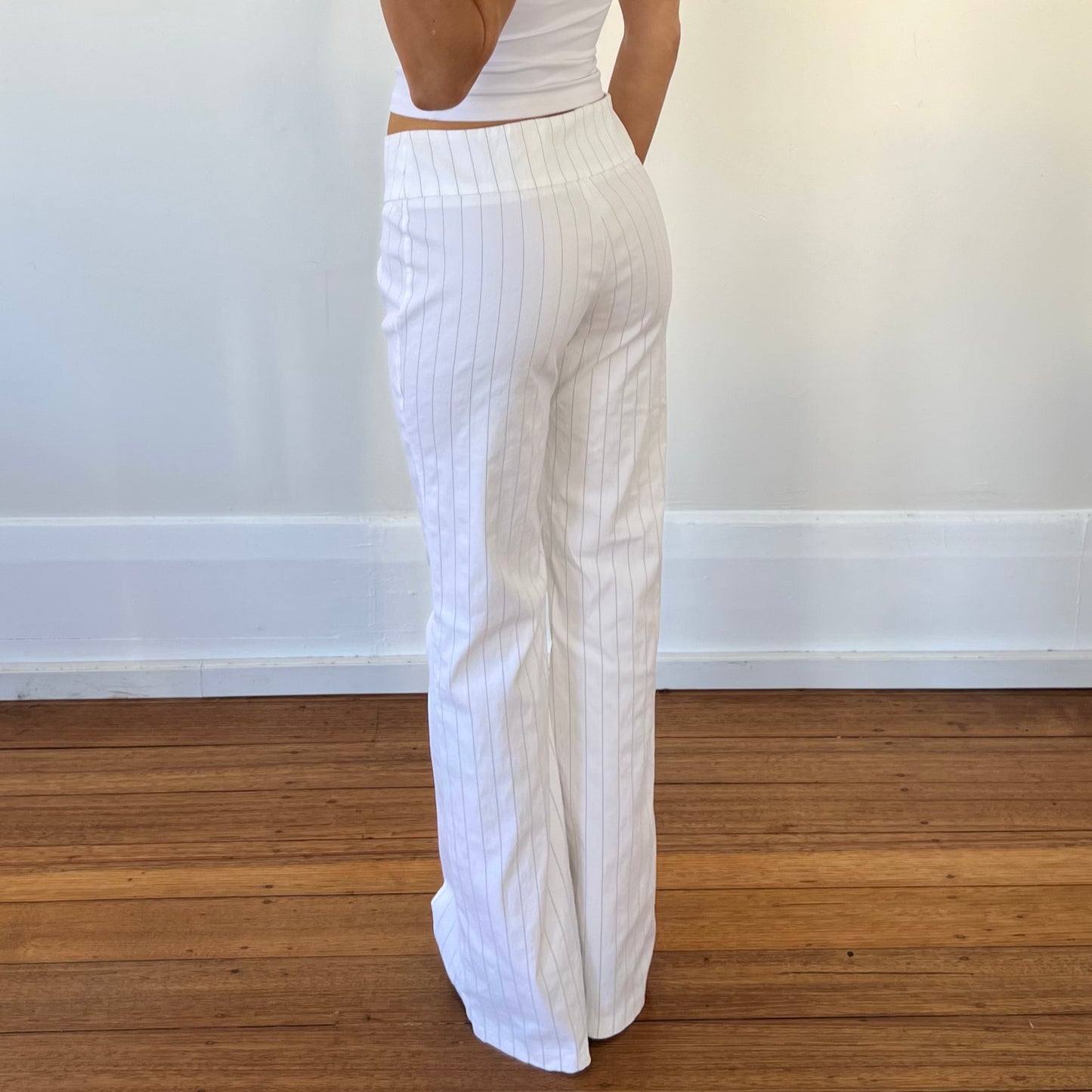 white pinstripe trousers