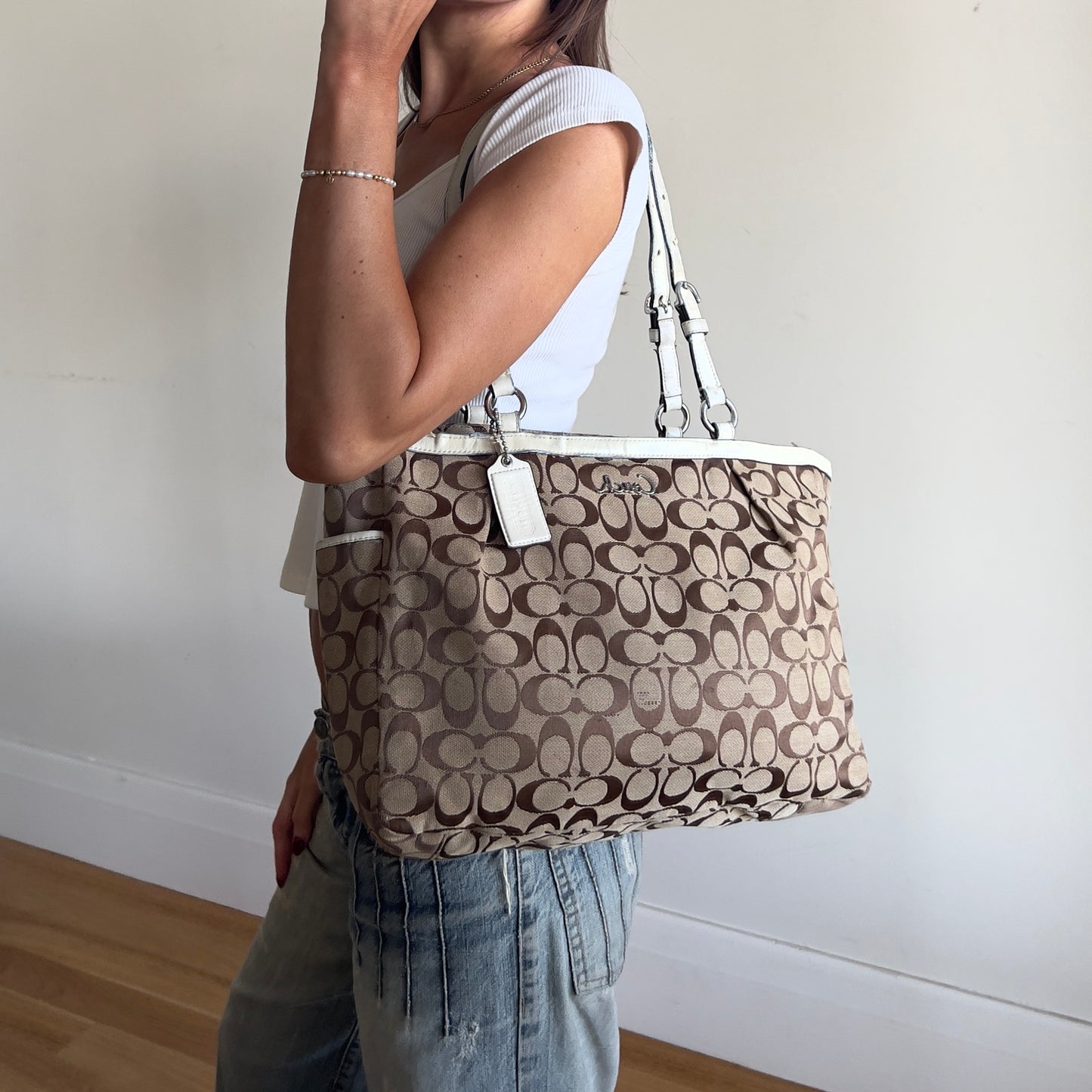 white signature Coach tote bag