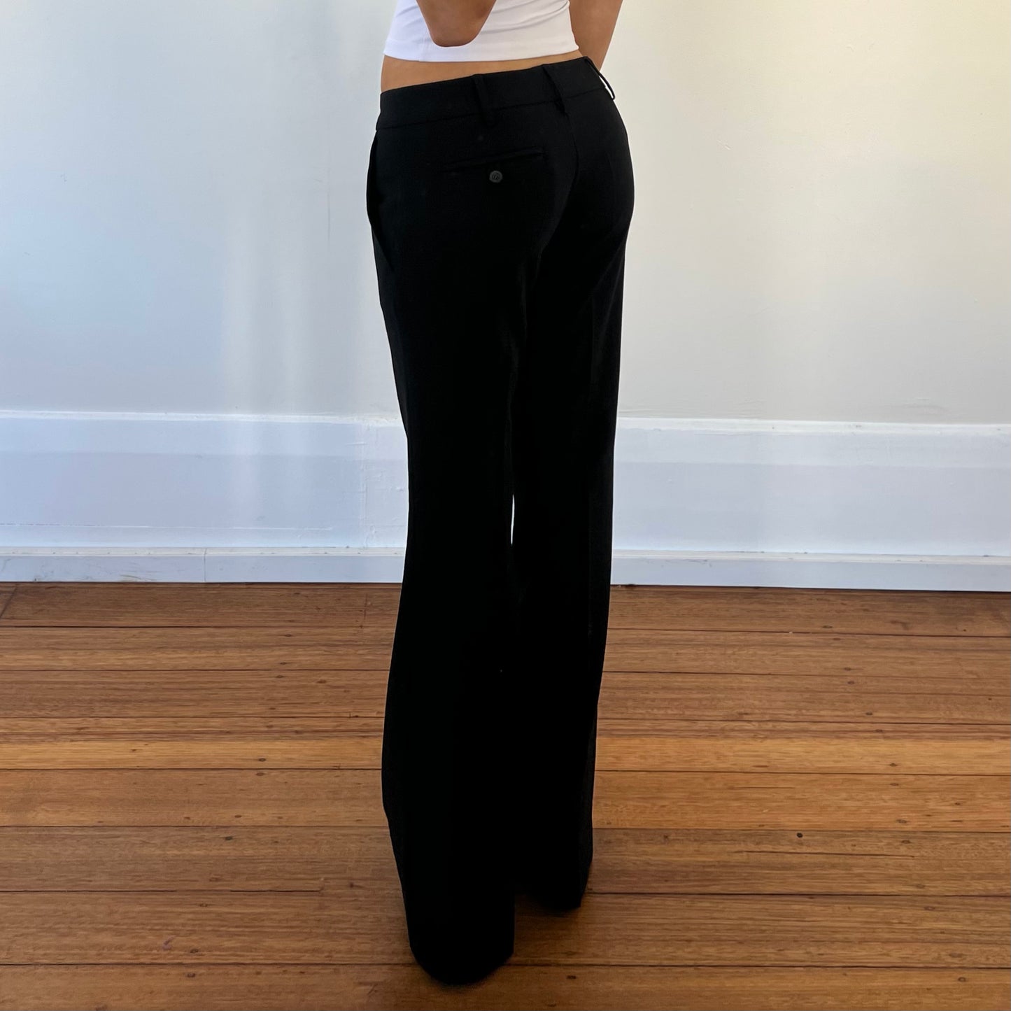 black low rise trousers