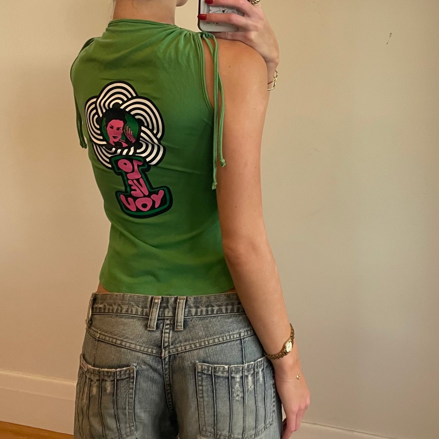 green graphic tank top