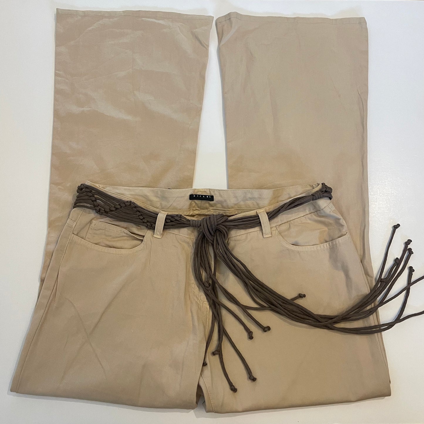 cream trousers w/ tassle belt