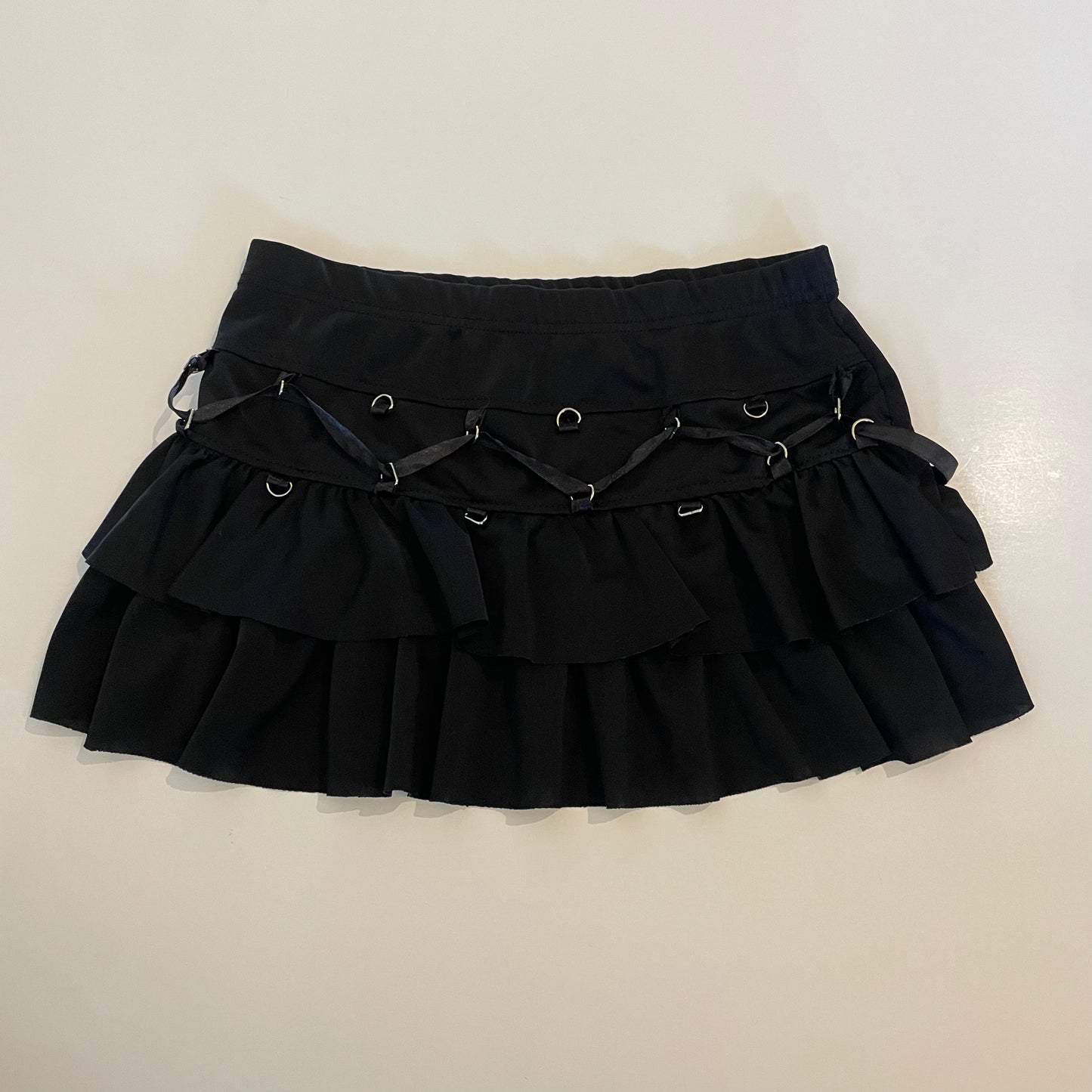 black frilly mini skirt