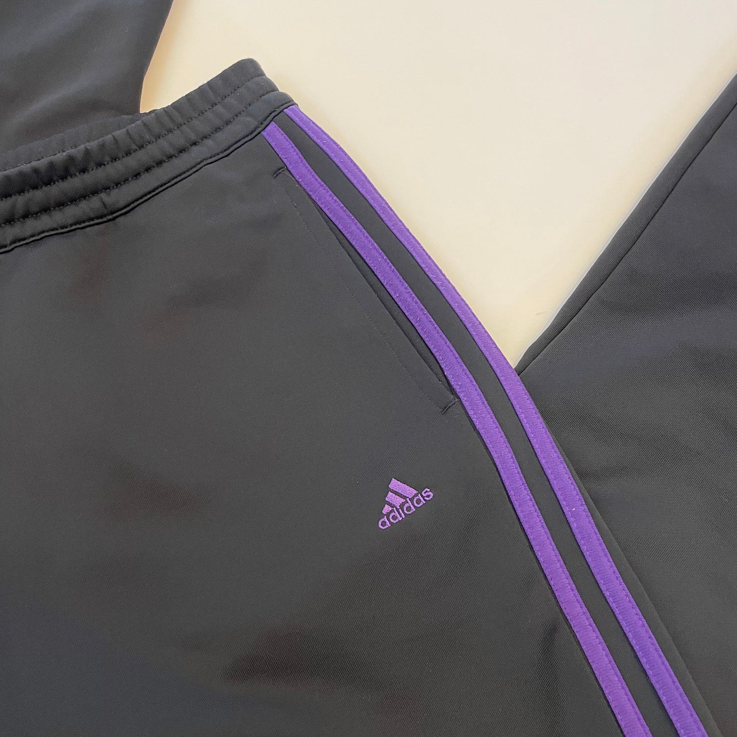 purple Adidas tracksuit pants