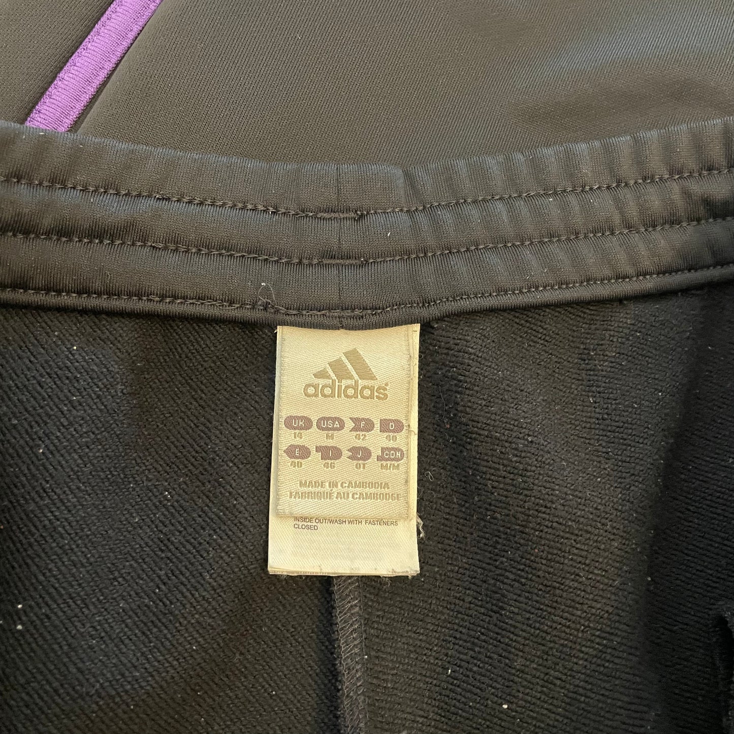 purple Adidas tracksuit pants