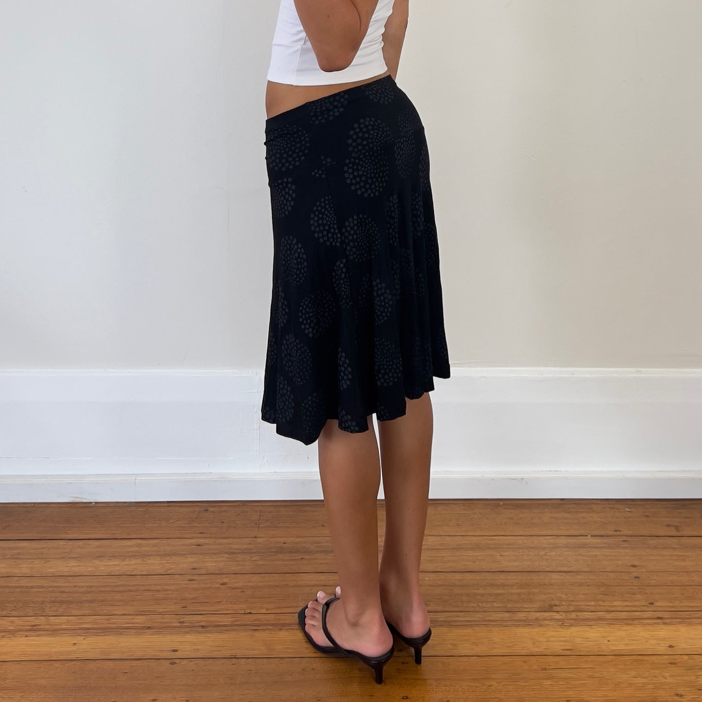 black graphic midi skirt